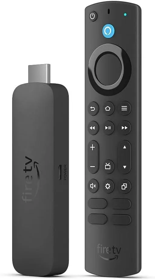 A Fire TV Stick 4K Max beside its remote